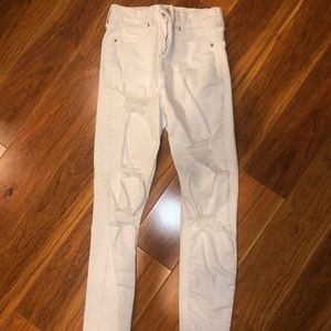 Topshop distressed white skinny jeans